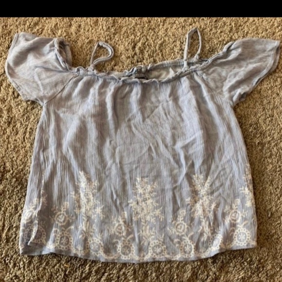 Blue short sleeve off shoulder blouse 
Smoke and pet free home
Size small - Picture 2 of 3